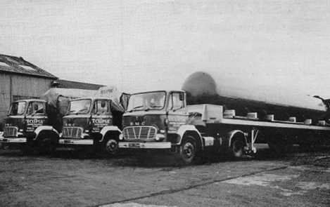 Three Eclipse trucks, carrying oil